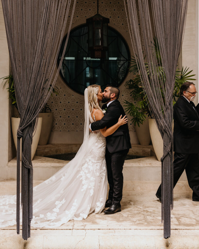 Alys Beach elopement. Florida destination wedding photographer and videographer. 30A wedding. First kiss