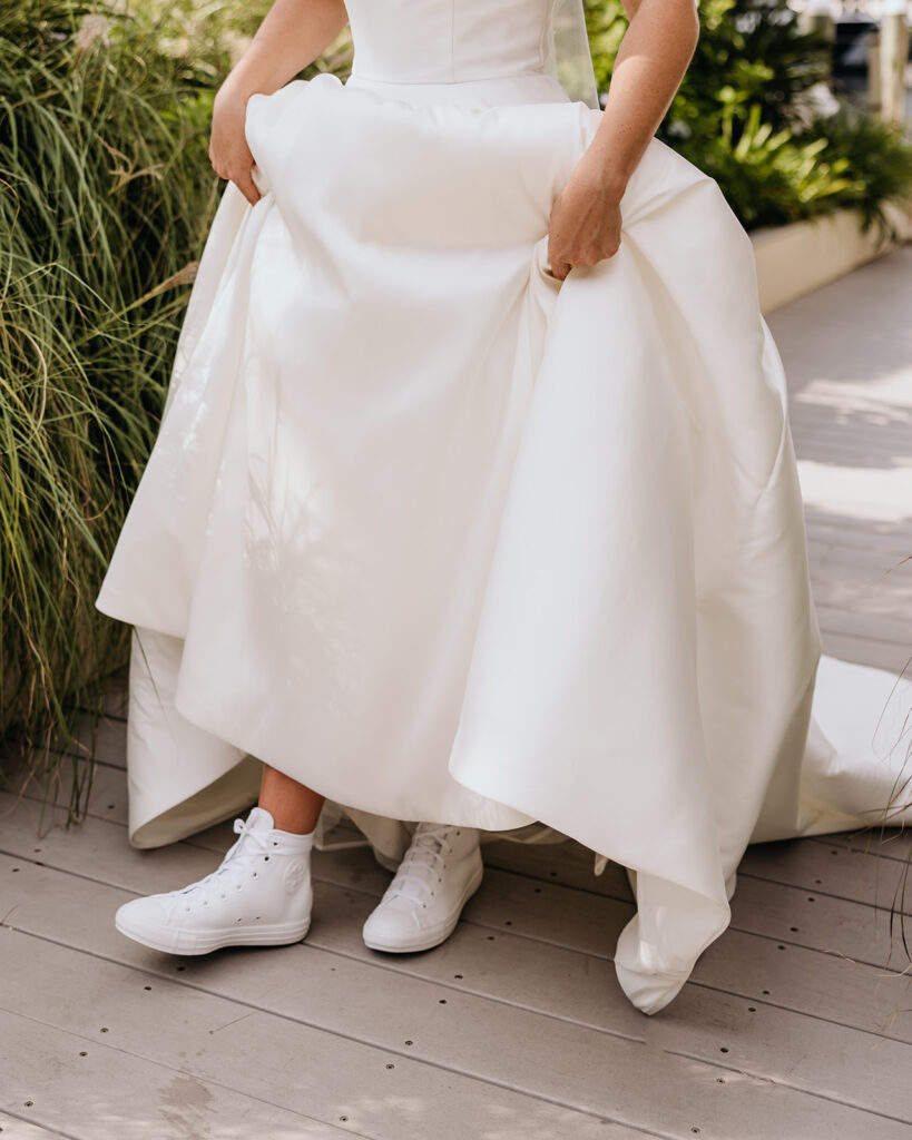 Bride shows off her wedding shoes