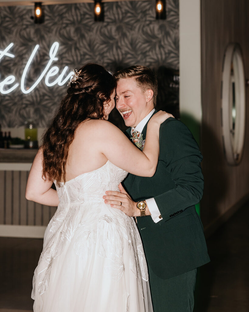 bride and groom share their first dance