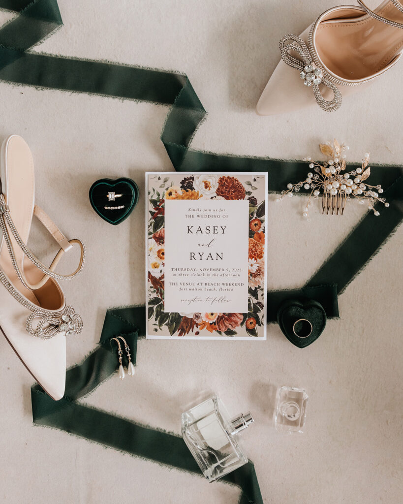 wedding invitations, heels, and rings