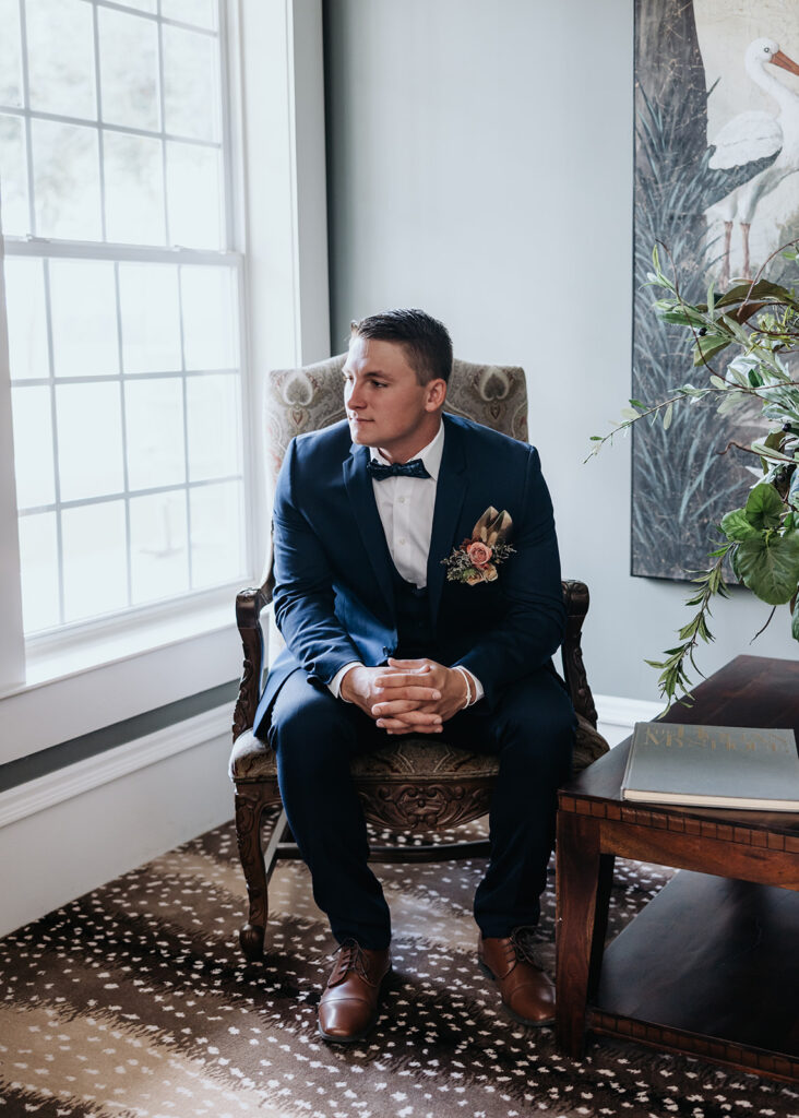 groom sits