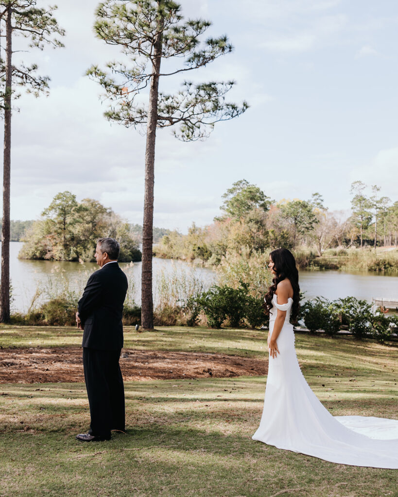 bride walks up to her father for the first look