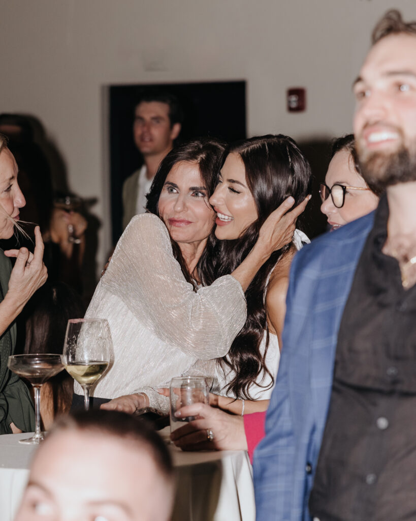 bride and mother react to a speech