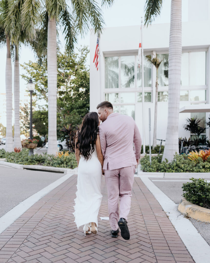 bride and groom walk around downtown Sarasota