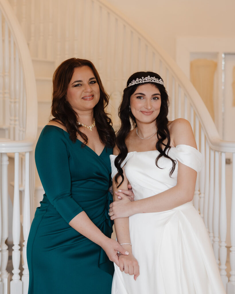 the bride and her mother smile