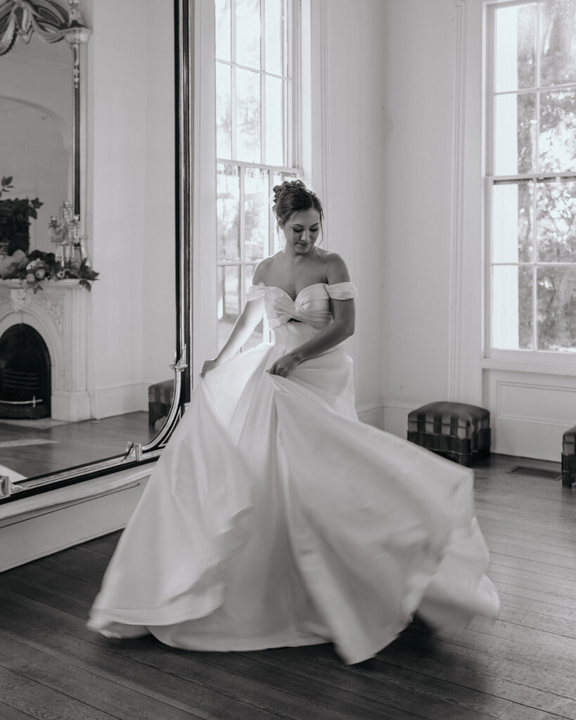 bride dances in her wedding dress