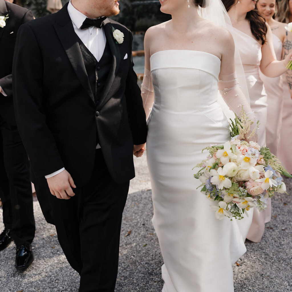 bride and groom walk