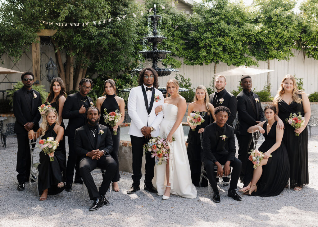 bride, groom, and wedding party act like they are in vogue