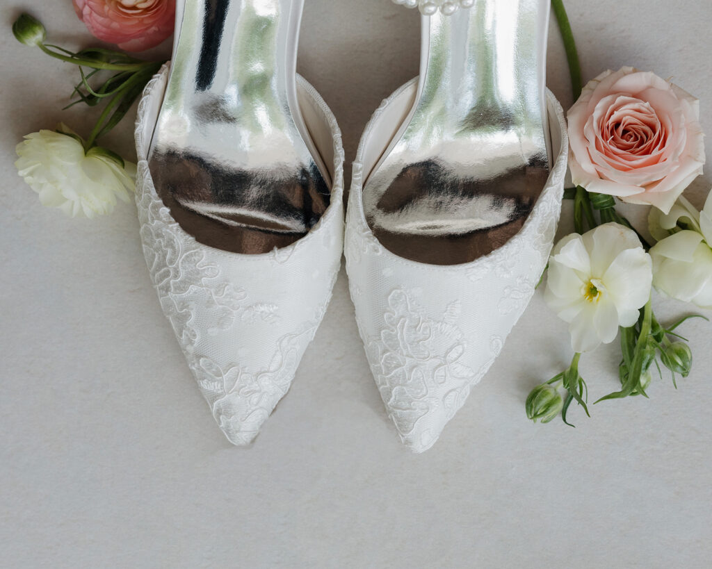bride's shoes with flowers