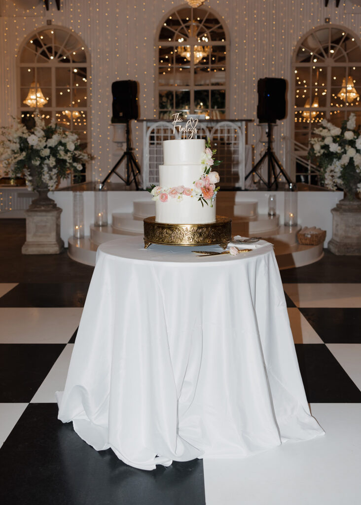 wedding cake sits on the dance floor