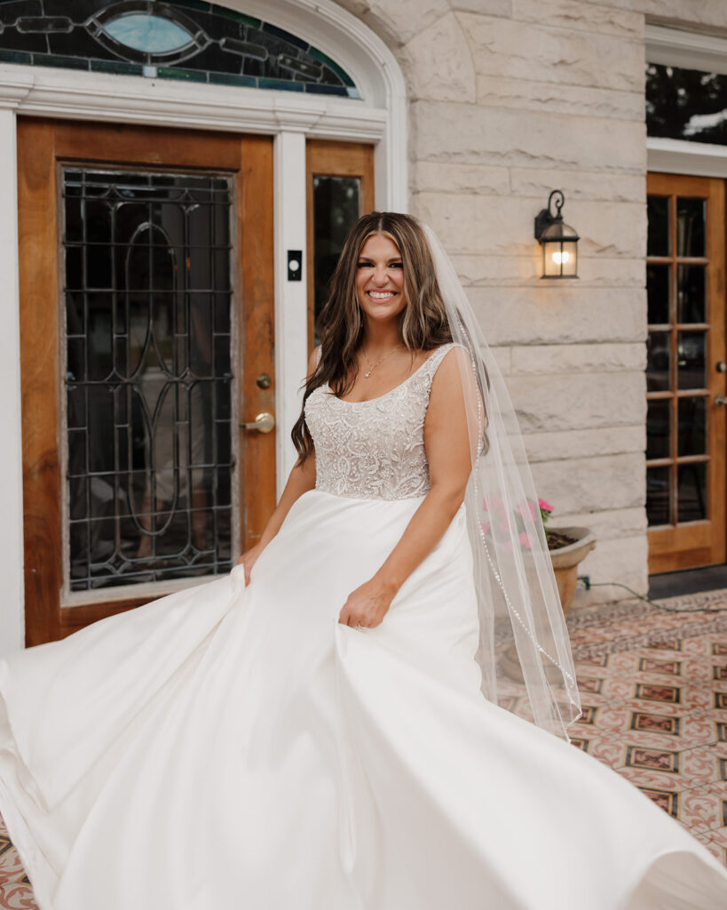 bride twirls in her dress