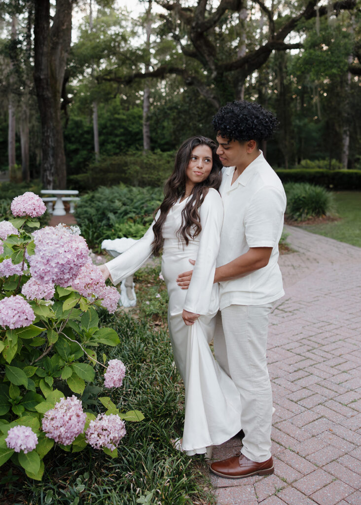 man and woman look at the flowers at Eden Gardens State Park