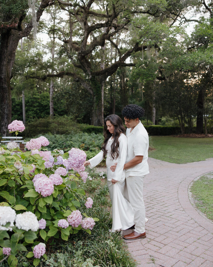 man and woman look at the flowers at Eden Gardens State Park