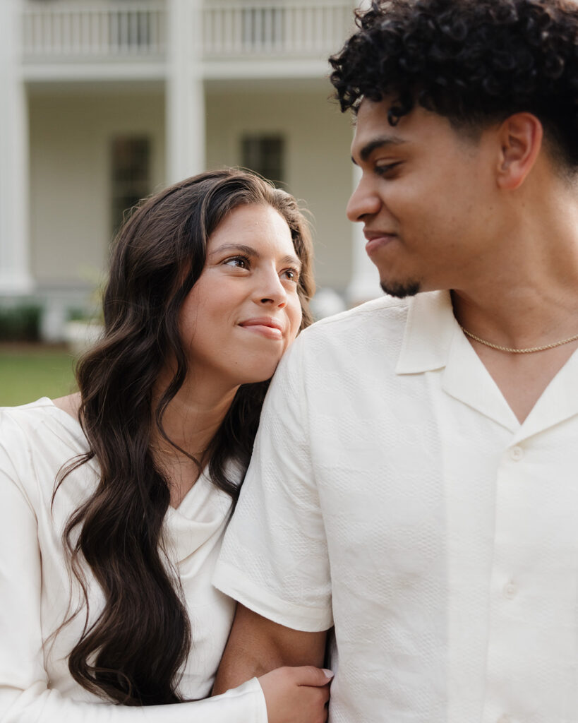 woman looks lovingly into man's eyes