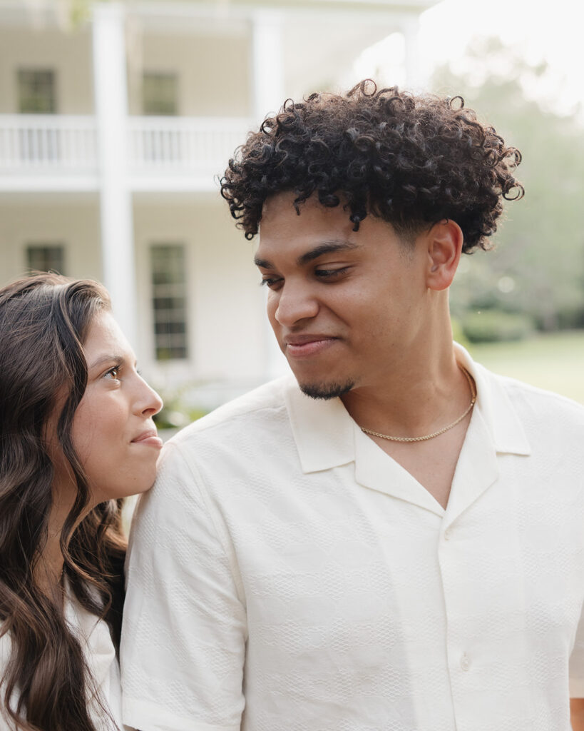 man looks lovingly into woman's eyes