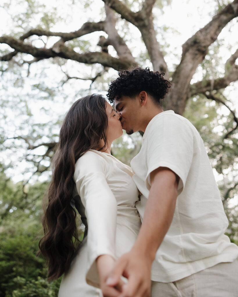 woman and man kiss