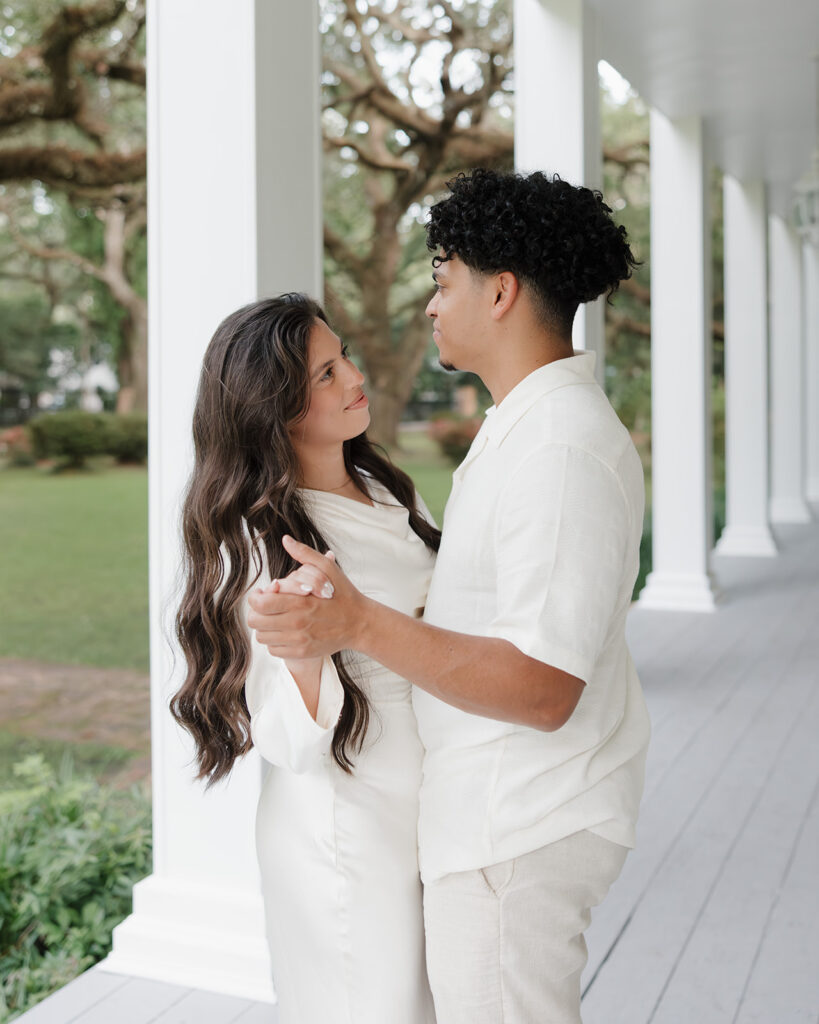 man and woman dance on the porch at Eden Gardens State Park