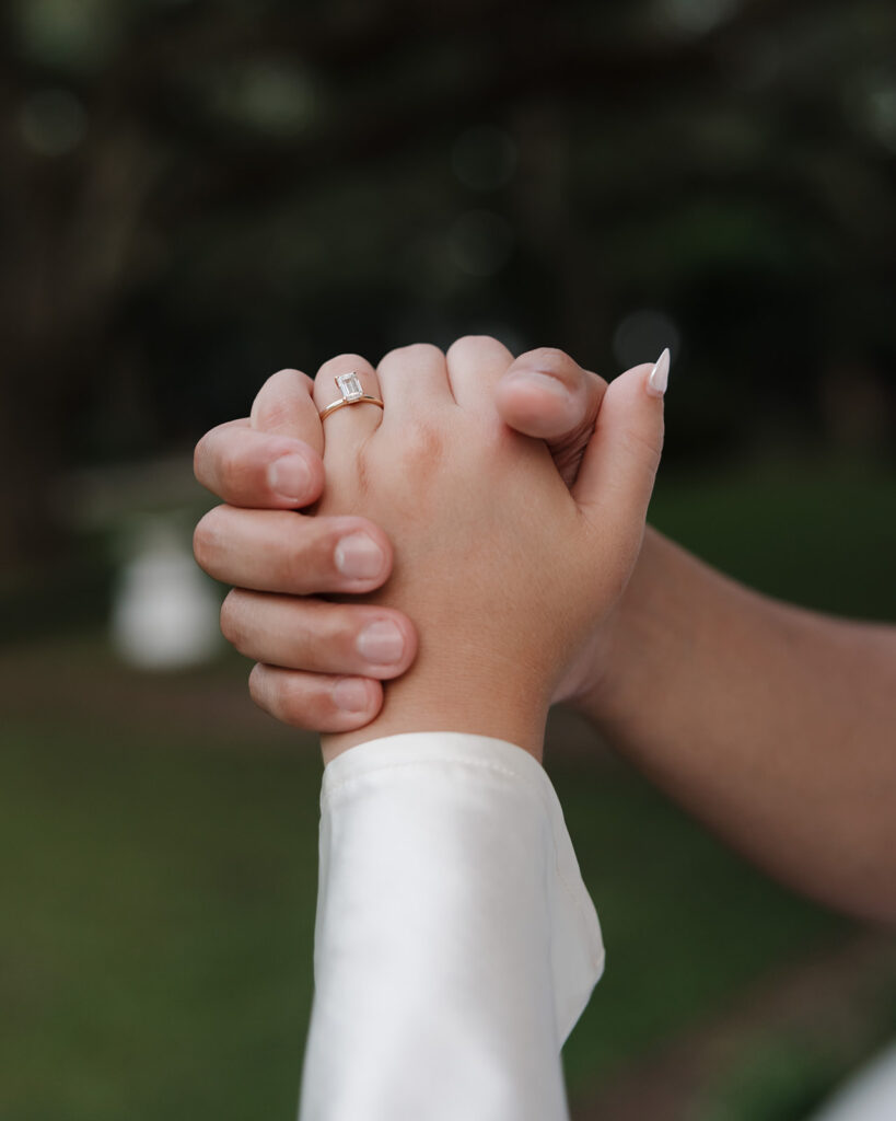 woman shows off her wedding ring