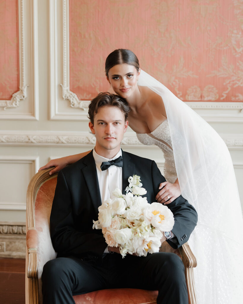 bride and groom pose in the Olana bridal suite