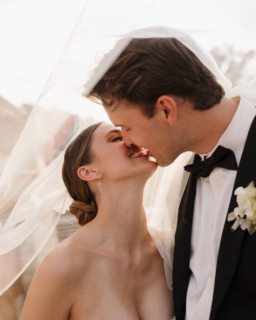 bride and groom kiss