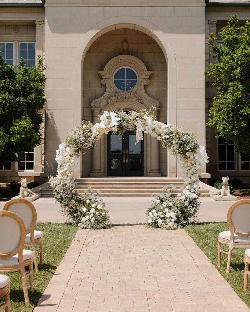 A floral arch at The Olana in Hickory Creek, TX