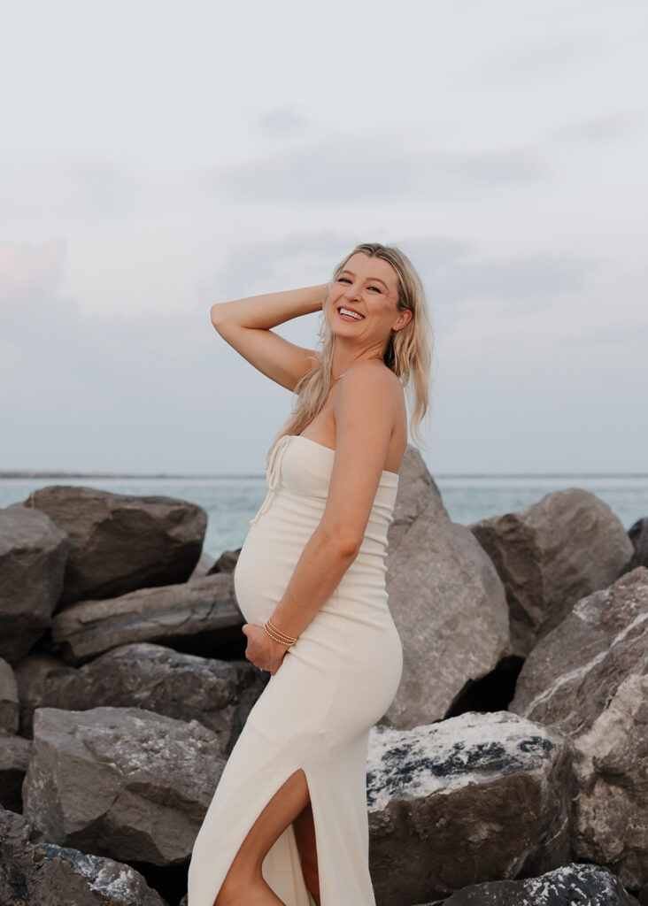 woman poses on Destin, Florida beach
