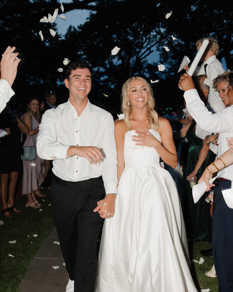 bride and groom exit the reception