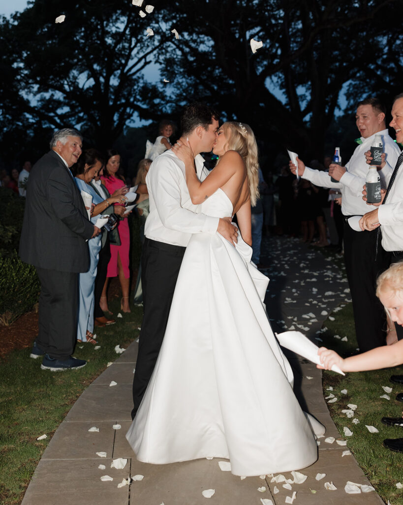 bride and groom kiss