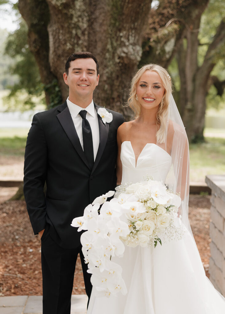 bride and groom smile