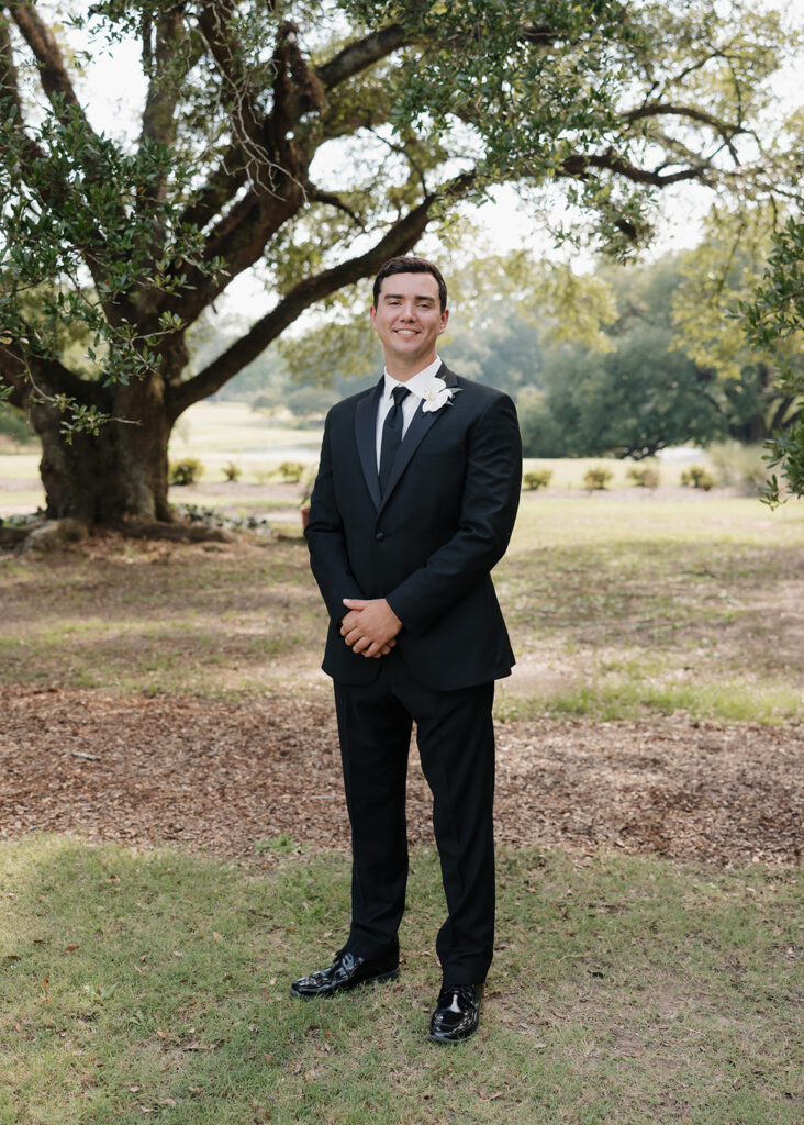 groom smiles at the Reed House in Jackson, MS