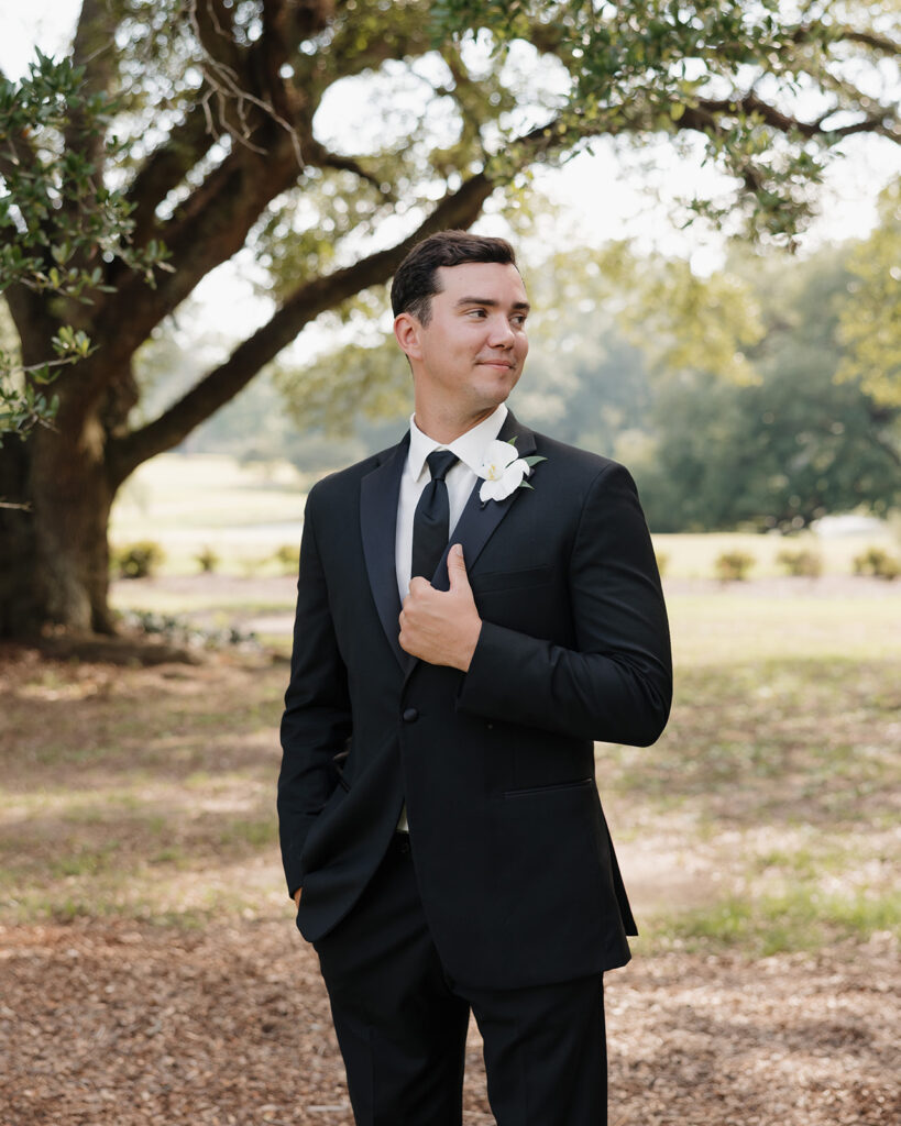 groom looks into the distance