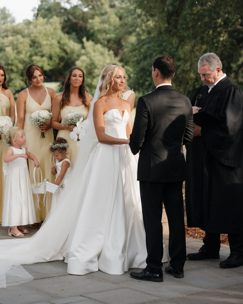 bride smiles at her groom