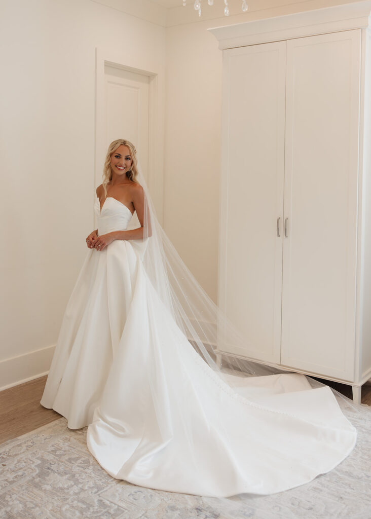 bride smiles at the Reed House in Jackson, MS