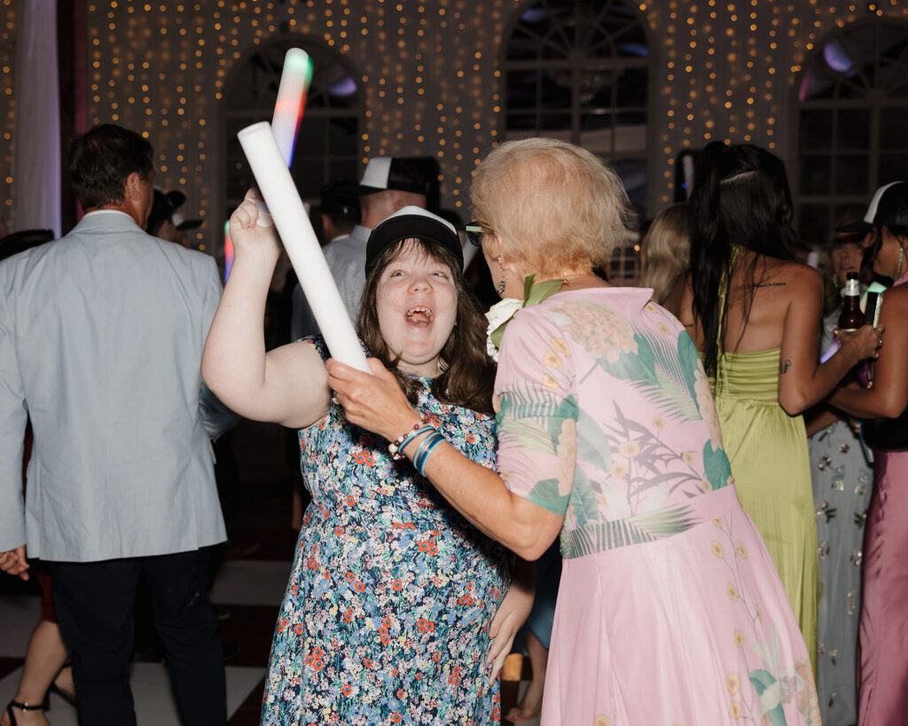 wedding guests dance at the reception