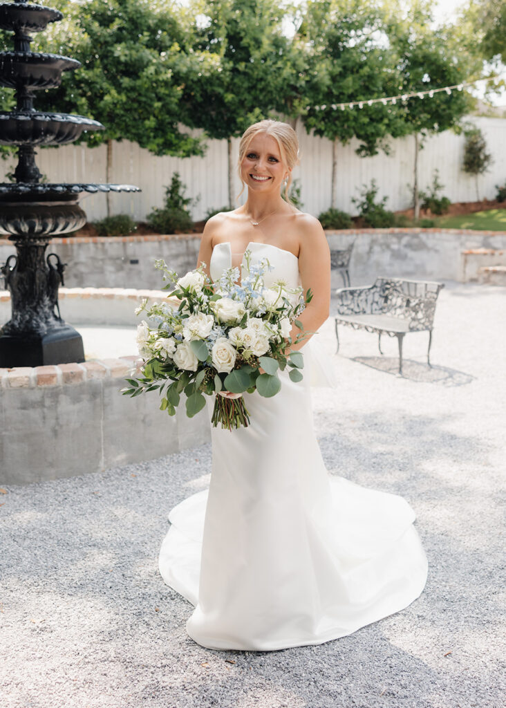 bride holds her bouquet