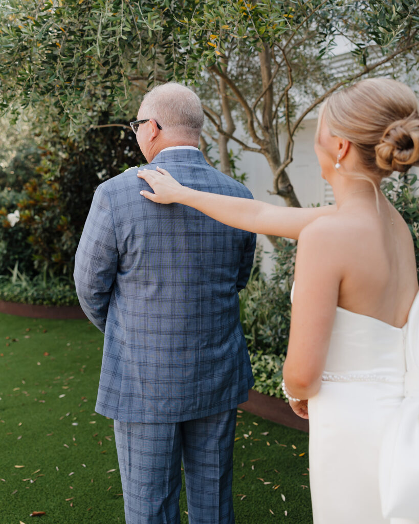 bride tells father to look at her