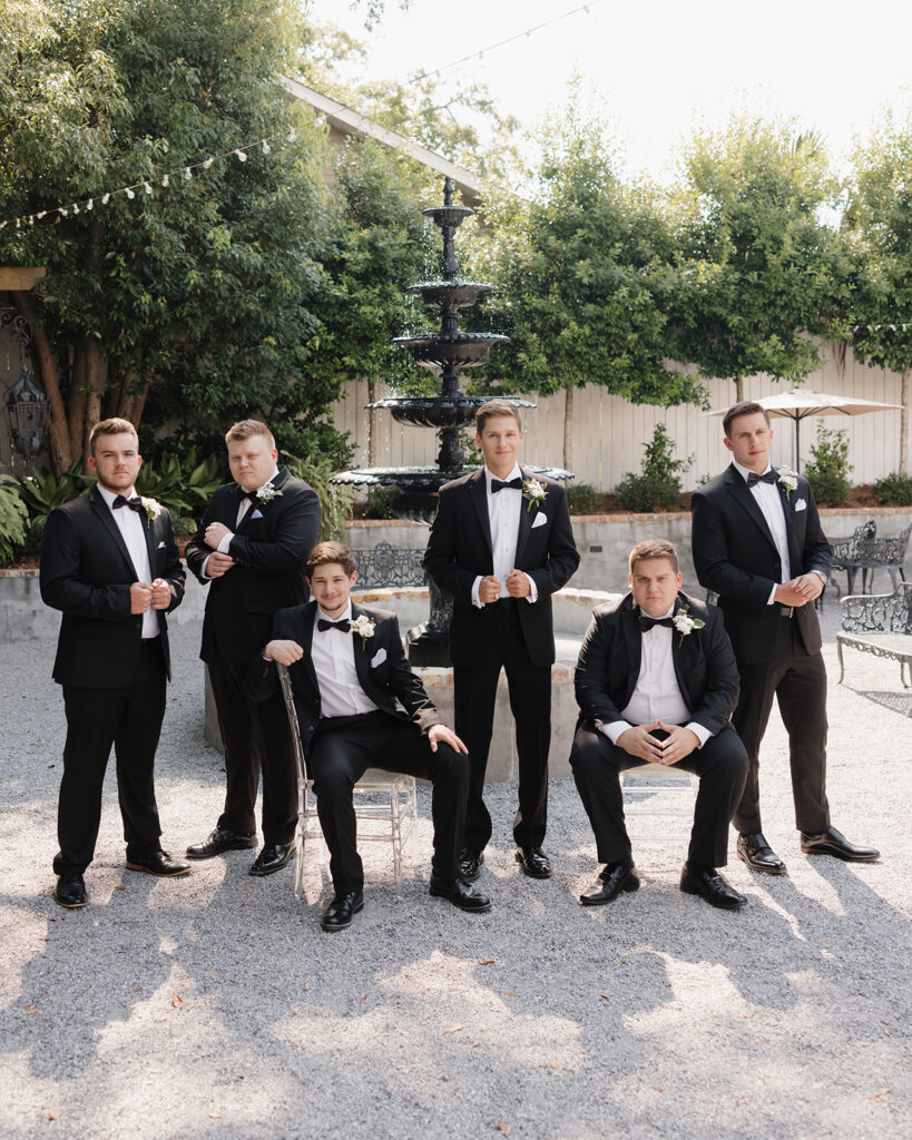 groom and groomsmen pose