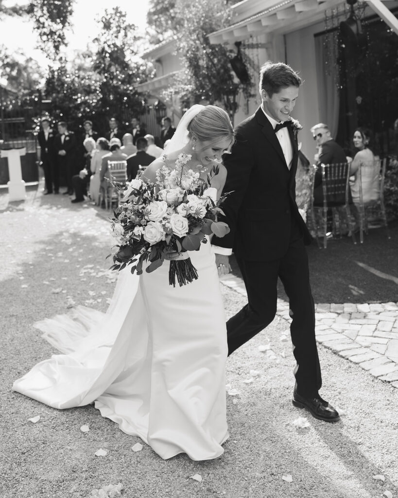 bride and groom cheer after their ceremony