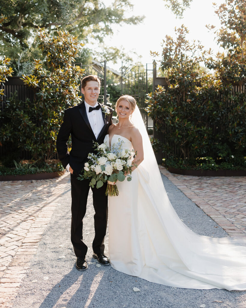 bride and groom smile