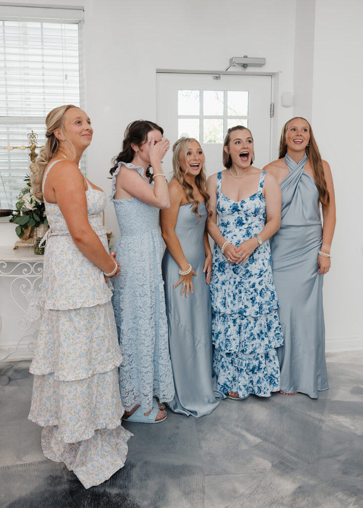 first look with bride and bridesmaids