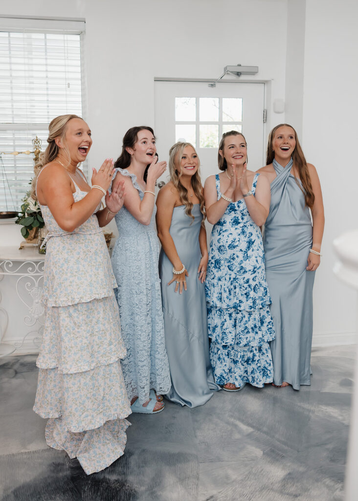 bridesmaids react to seeing the bride