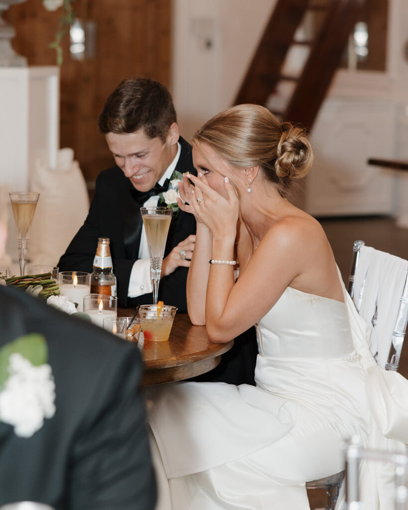 bride and groom cry during speeches