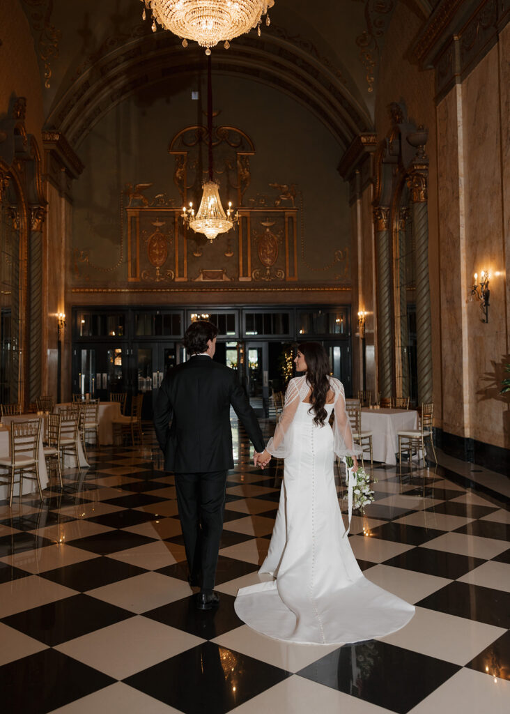 bride and groom walk through the Show at Shea's Seneca in New York City