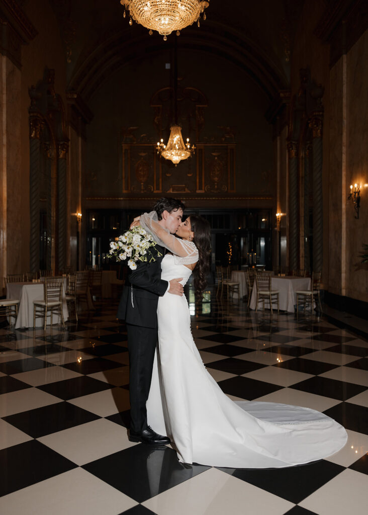 bride and groom kiss in New York City