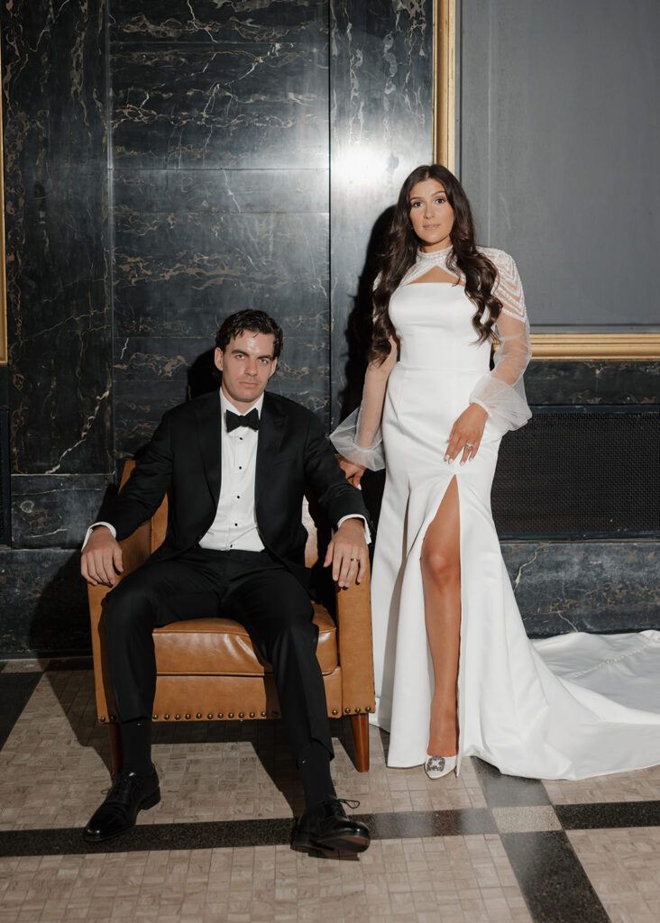 bride and groom pose for magazine