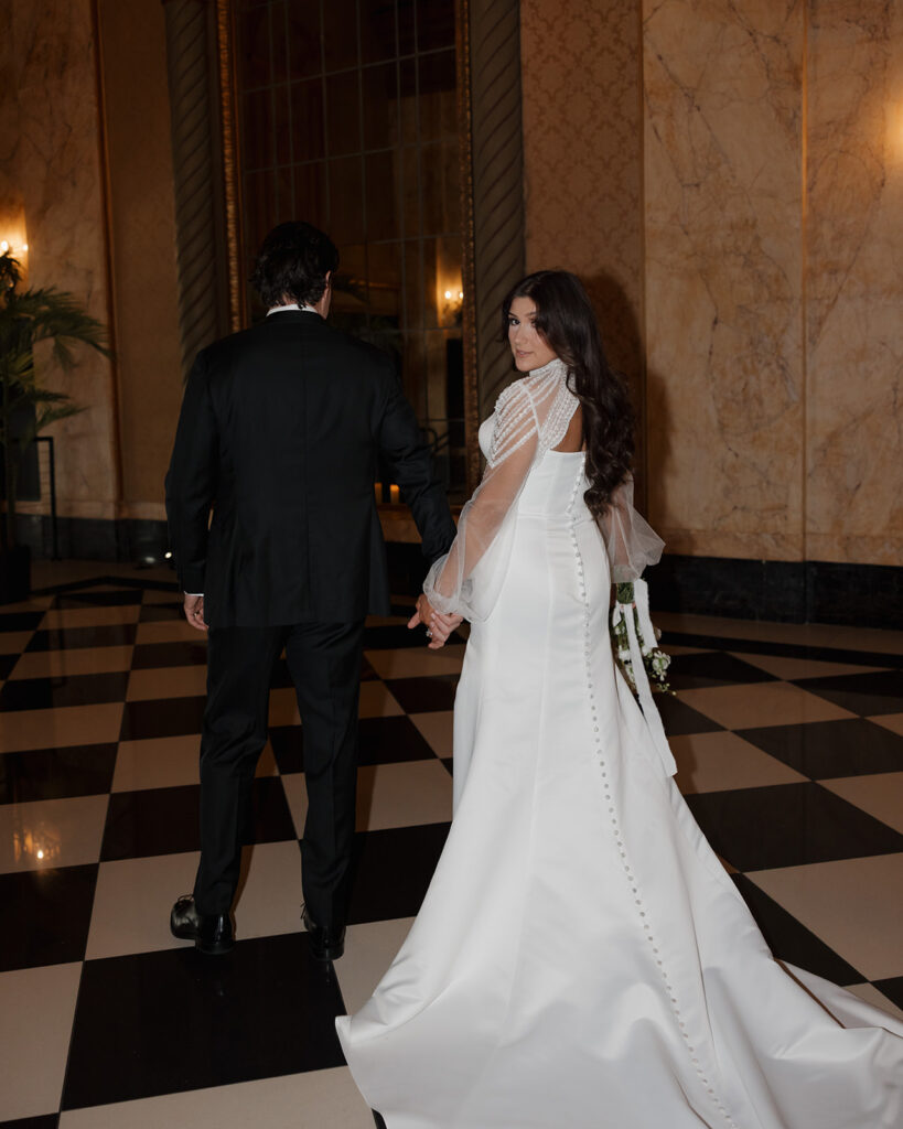 bride and groom walk