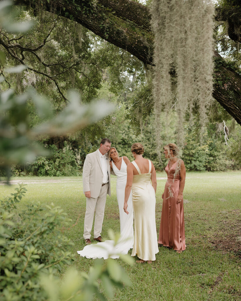 bride and family share a private moment