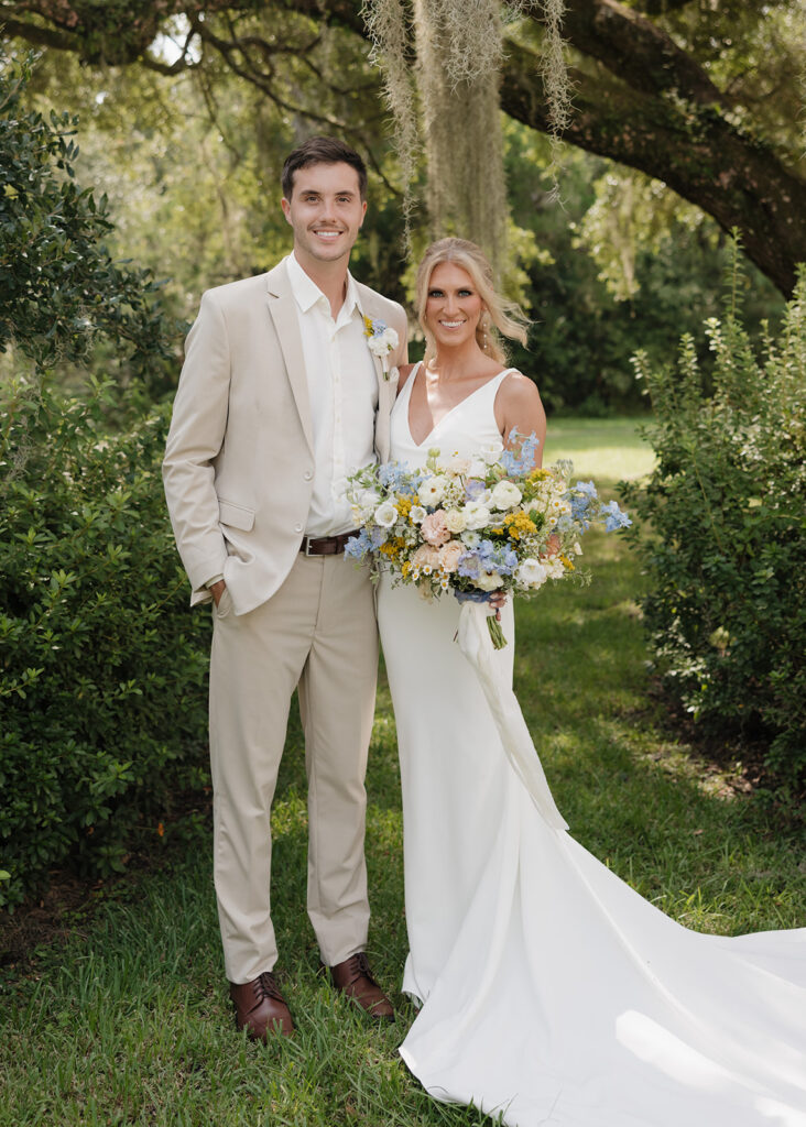 bride and groom smile