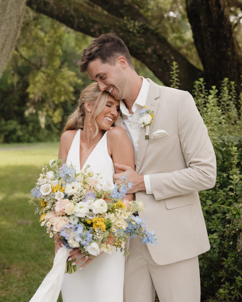 Groom and bride hug