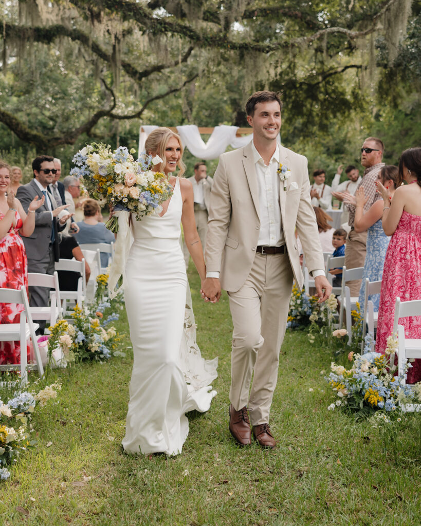 bride and groom cheer